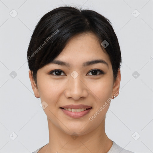 Joyful asian young-adult female with short  black hair and brown eyes