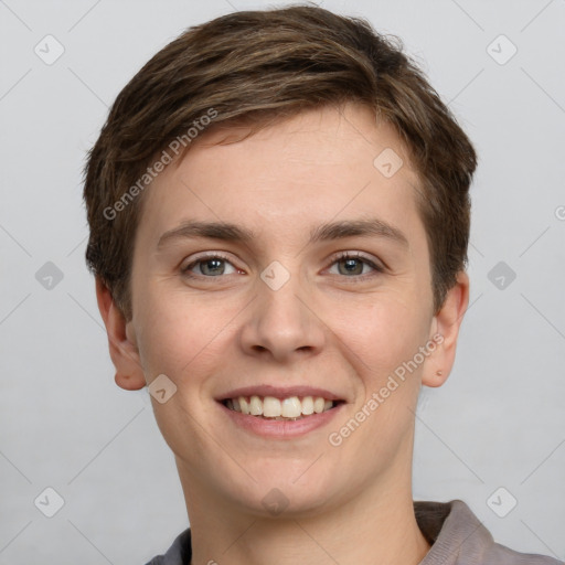 Joyful white young-adult female with short  brown hair and grey eyes