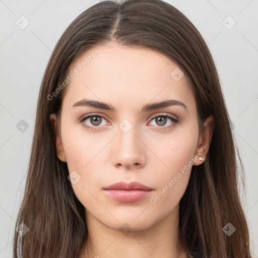 Neutral white young-adult female with long  brown hair and brown eyes