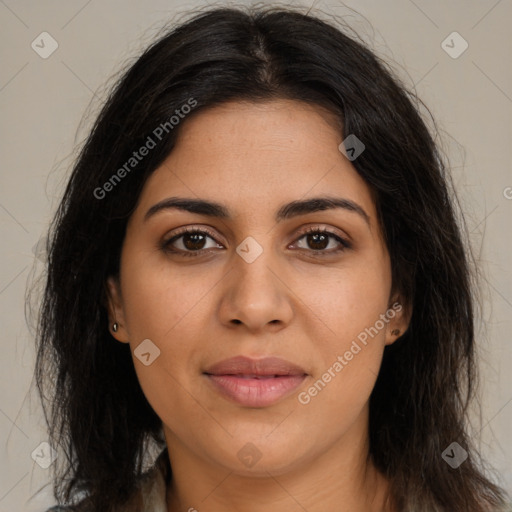 Joyful latino young-adult female with long  brown hair and brown eyes