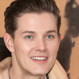 Joyful white young-adult male with medium  brown hair and brown eyes