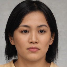 Neutral asian young-adult female with medium  black hair and brown eyes