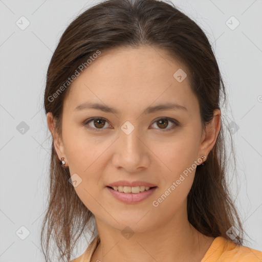 Joyful white young-adult female with long  brown hair and brown eyes