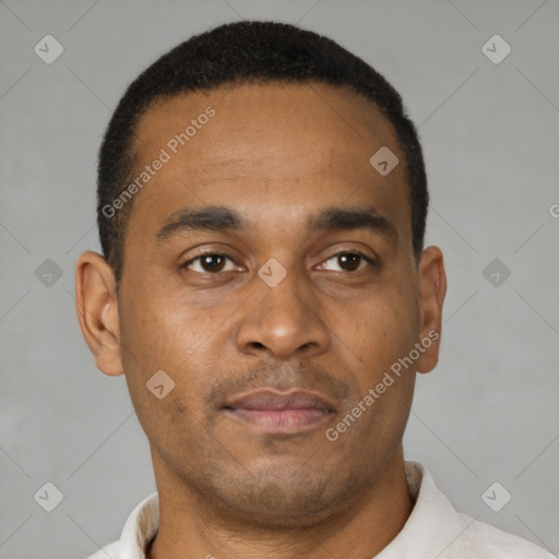 Neutral latino young-adult male with short  brown hair and brown eyes