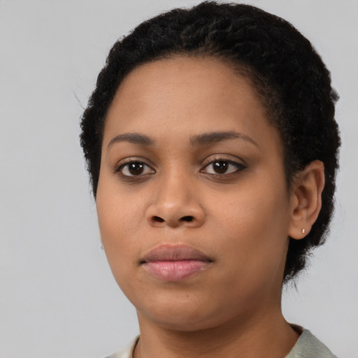 Neutral black young-adult female with short  black hair and brown eyes