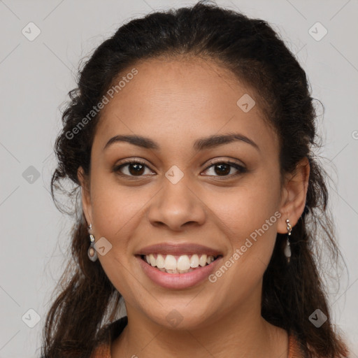 Joyful latino young-adult female with long  brown hair and brown eyes