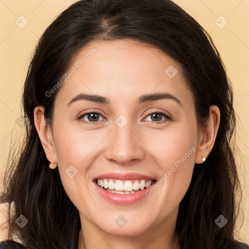 Joyful white young-adult female with long  brown hair and brown eyes