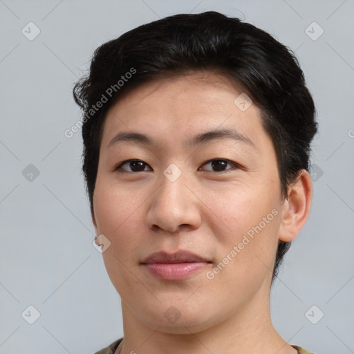 Joyful asian young-adult female with short  brown hair and brown eyes