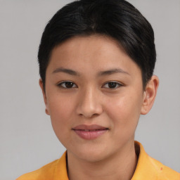 Joyful asian young-adult female with short  brown hair and brown eyes