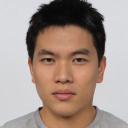 Neutral asian young-adult male with short  brown hair and brown eyes