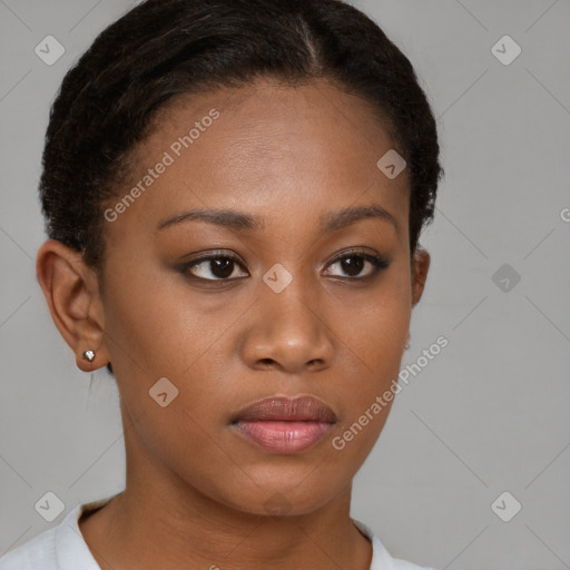 Neutral black young-adult female with short  brown hair and brown eyes