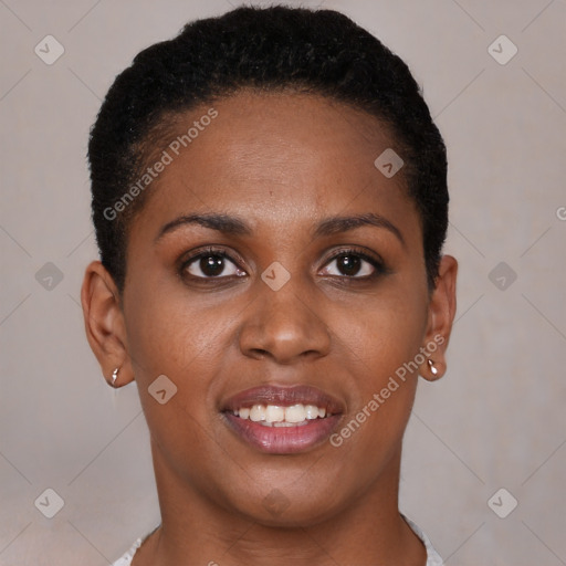 Joyful black young-adult female with short  brown hair and brown eyes