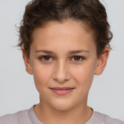 Joyful white child female with short  brown hair and brown eyes