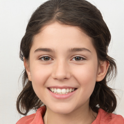 Joyful white child female with medium  brown hair and brown eyes