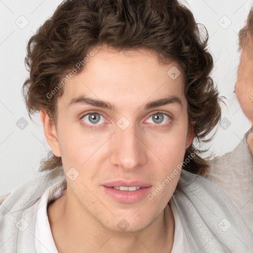 Joyful white young-adult female with short  brown hair and blue eyes