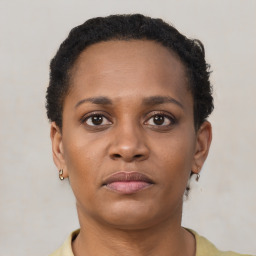 Neutral black young-adult female with short  brown hair and brown eyes