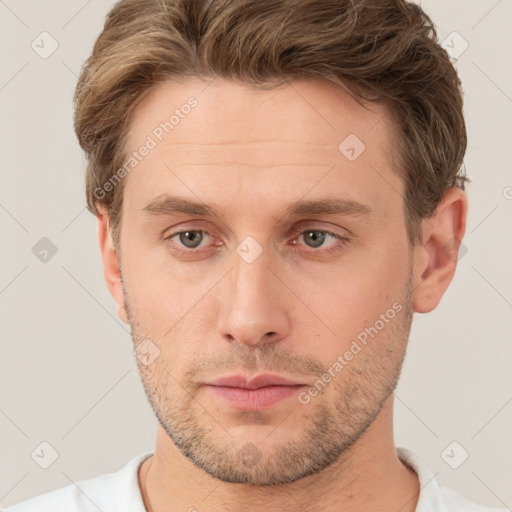 Neutral white young-adult male with short  brown hair and brown eyes