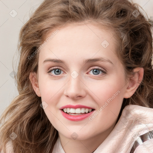 Joyful white young-adult female with long  brown hair and blue eyes