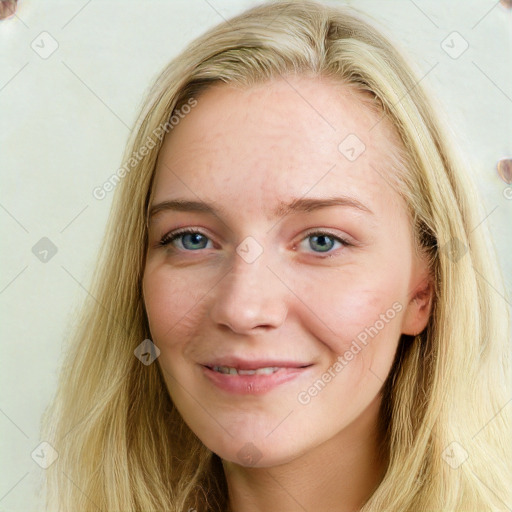 Joyful white young-adult female with long  brown hair and blue eyes