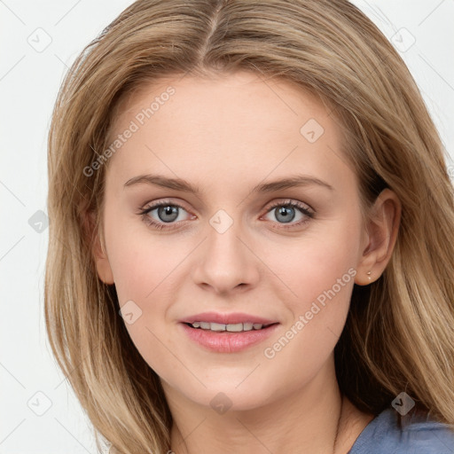 Joyful white young-adult female with long  brown hair and blue eyes