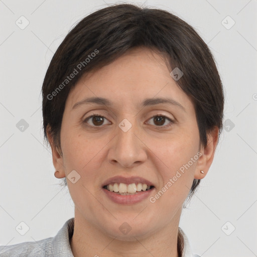 Joyful white adult female with short  brown hair and brown eyes