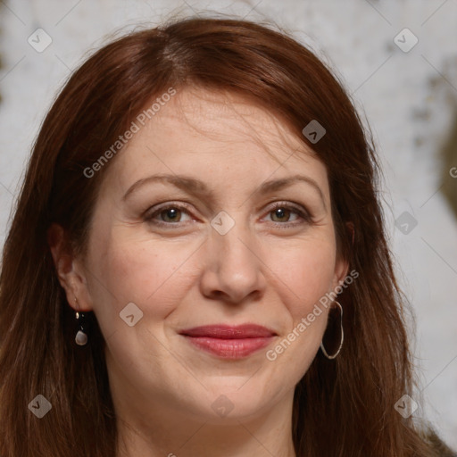 Joyful white adult female with long  brown hair and brown eyes