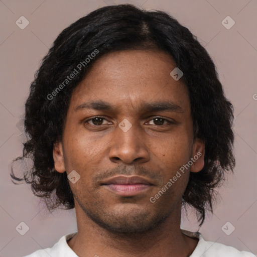 Neutral black young-adult male with short  brown hair and brown eyes