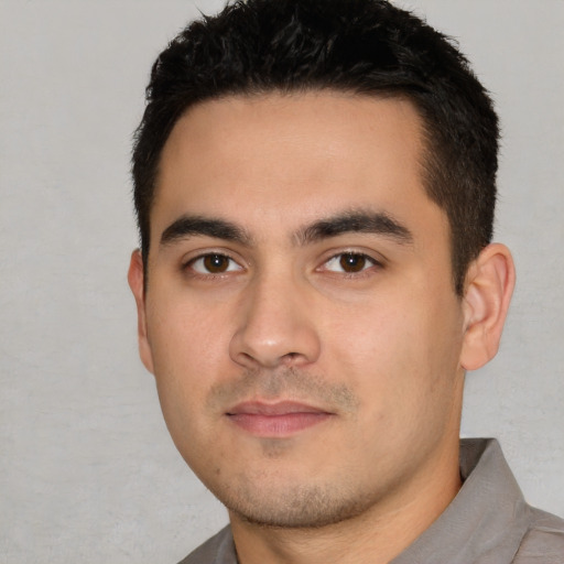 Neutral white young-adult male with short  black hair and brown eyes