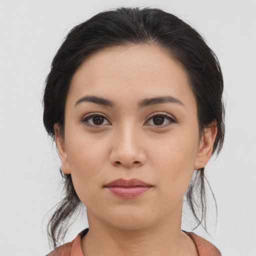 Joyful asian young-adult female with medium  brown hair and brown eyes
