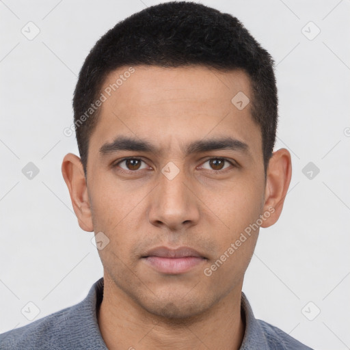 Neutral latino young-adult male with short  black hair and brown eyes