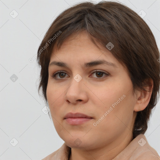 Neutral white young-adult female with medium  brown hair and brown eyes