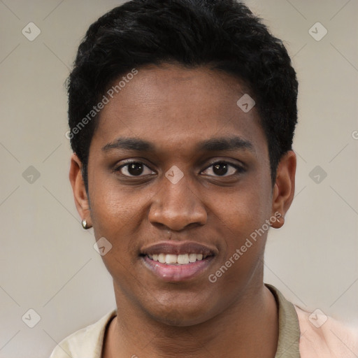 Joyful black young-adult male with short  black hair and brown eyes
