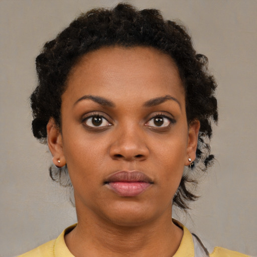 Neutral black young-adult female with short  brown hair and brown eyes