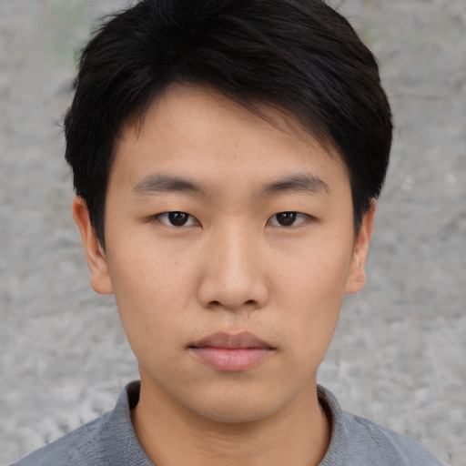 Neutral asian young-adult male with short  brown hair and brown eyes