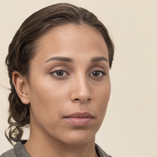 Neutral white young-adult female with medium  brown hair and brown eyes