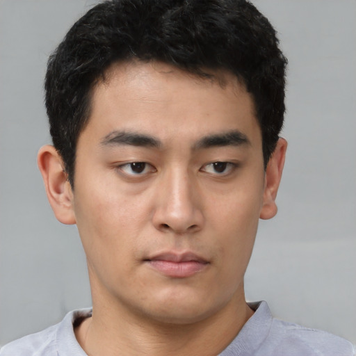 Neutral asian young-adult male with short  black hair and brown eyes
