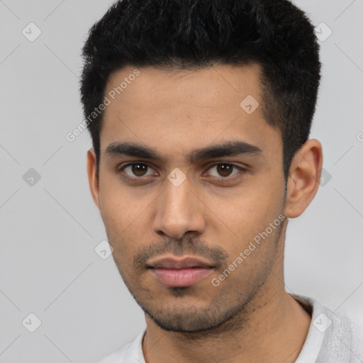 Neutral latino young-adult male with short  black hair and brown eyes