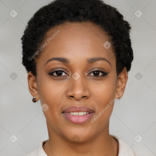 Joyful black young-adult female with short  black hair and brown eyes