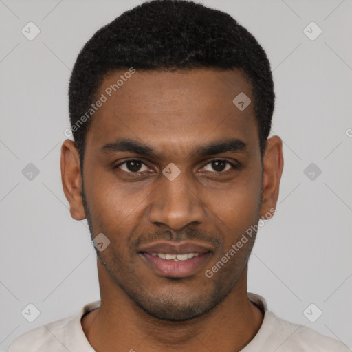 Joyful black young-adult male with short  black hair and brown eyes