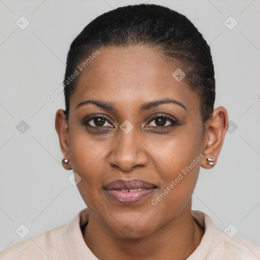Joyful black adult female with short  black hair and brown eyes