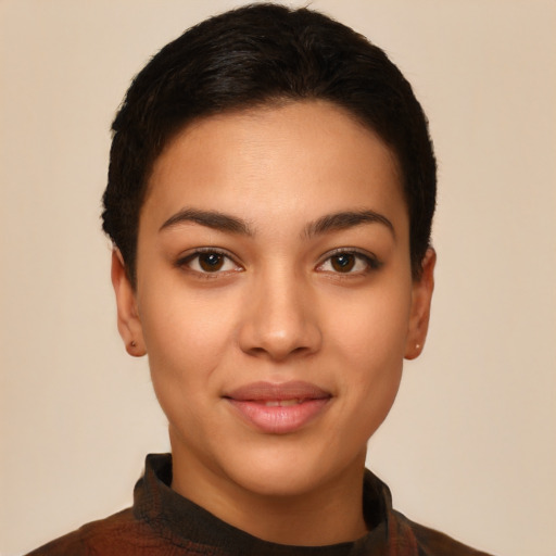 Joyful latino young-adult female with short  black hair and brown eyes