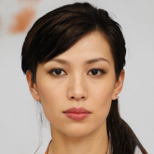 Neutral asian young-adult female with medium  black hair and brown eyes