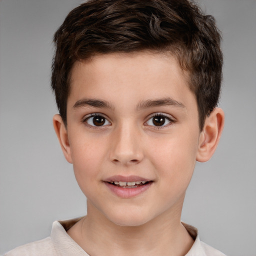 Joyful white child male with short  brown hair and brown eyes