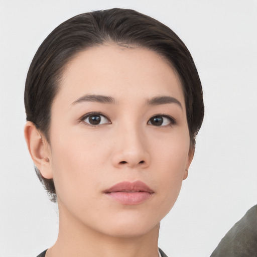 Neutral asian young-adult female with short  brown hair and brown eyes