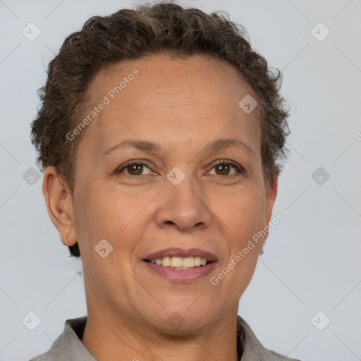 Joyful white adult female with short  brown hair and brown eyes