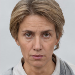 Neutral white adult female with short  brown hair and brown eyes