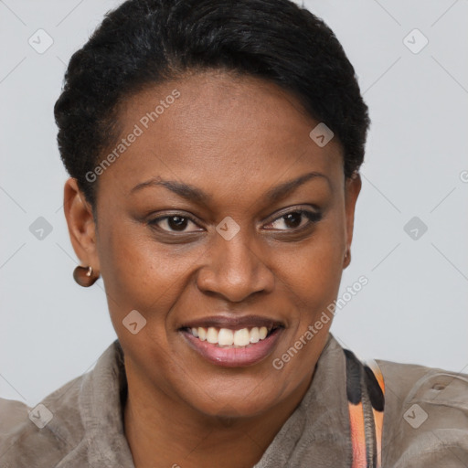 Joyful black young-adult female with short  brown hair and brown eyes