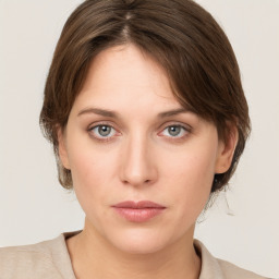 Neutral white young-adult female with medium  brown hair and grey eyes