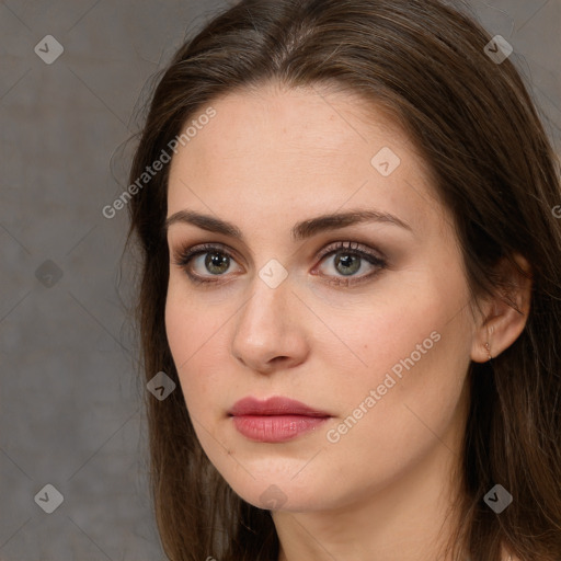 Neutral white young-adult female with long  brown hair and brown eyes