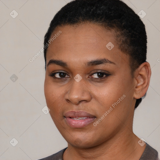 Joyful latino young-adult female with short  black hair and brown eyes